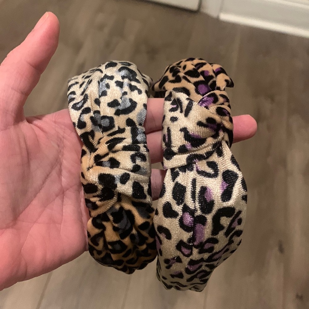 Two velvet cheetah print headbands, never worn.